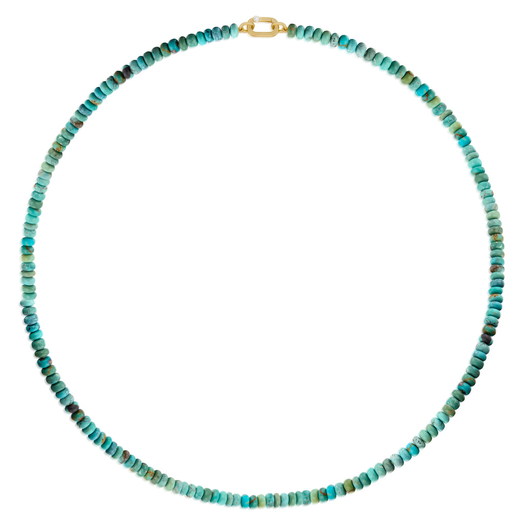 A beaded necklace made of small turquoise-blue and green marbled beads with a gold clasp, displayed on a clean white background.